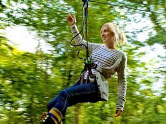 Girl on zip wire at Go Ape