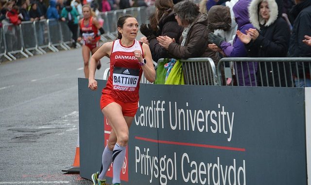student woman running at Cardiff University