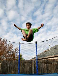 jumping on an outdoor trampoline for fitness