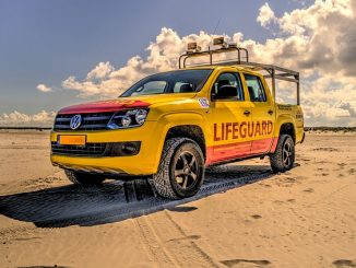 Sun, Sea and surf working as a lifeguard