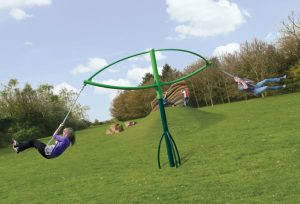 Rotating playground swing for teens