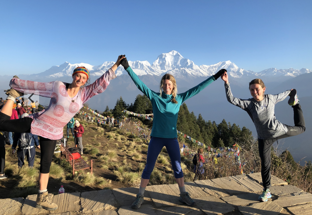 Group trekking in the mountains for health and wellness retreats