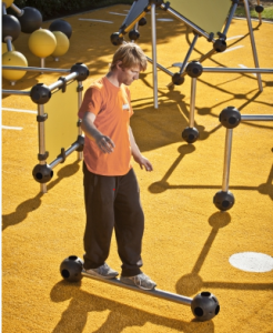Balancing on parkour playground equipment